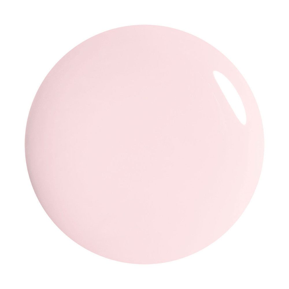 Goutte de vernis à ongles rose clair. Forme ronde, surface brillante.