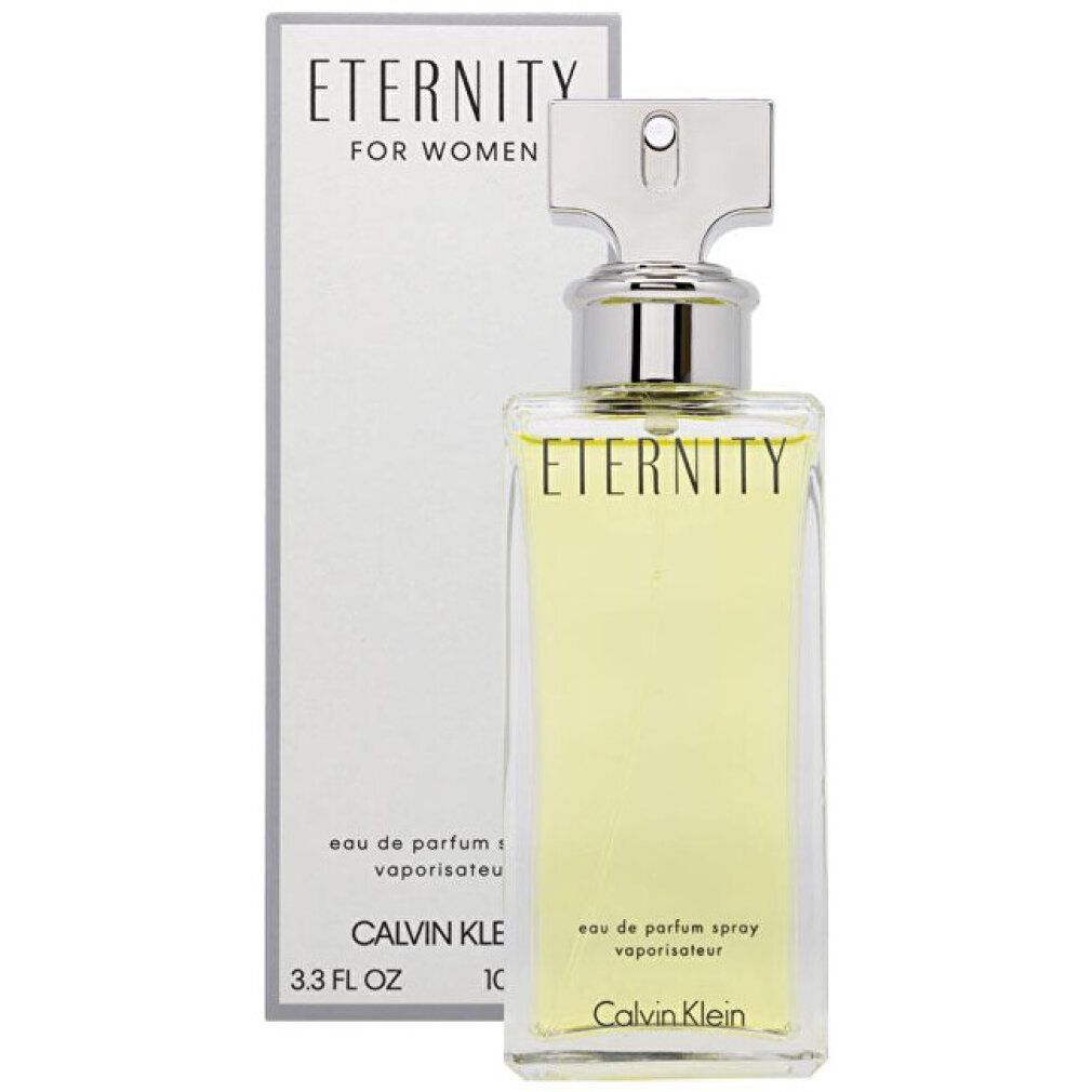 Eau de Parfum fles en verpakking. Opschrift: Eternity for Women, Calvin Klein. Rechthoekige fles met zilveren dop.
