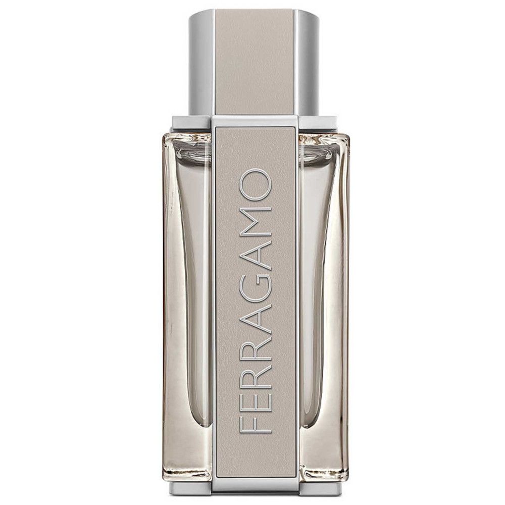 Flacon de parfum. Flacon beige clair avec bouchon argenté. Inscriptions verticales sur le flacon.