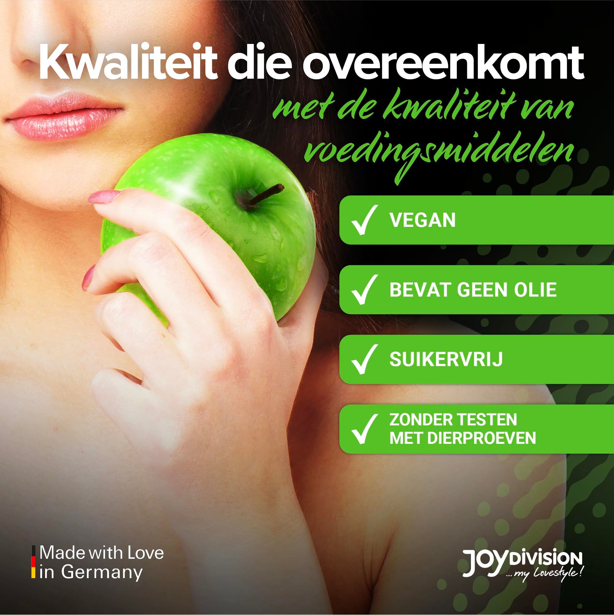 Fles WARMUP® Groene Appel Massage-Liquid met zwarte dop, appel-etiket en spatten.