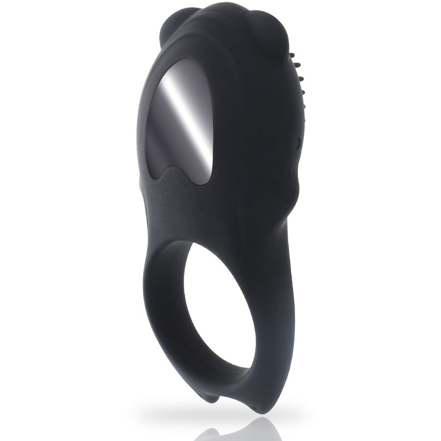 Vue latérale d'un vibrateur anneau noir avec télécommande. Un insert métallique est visible.