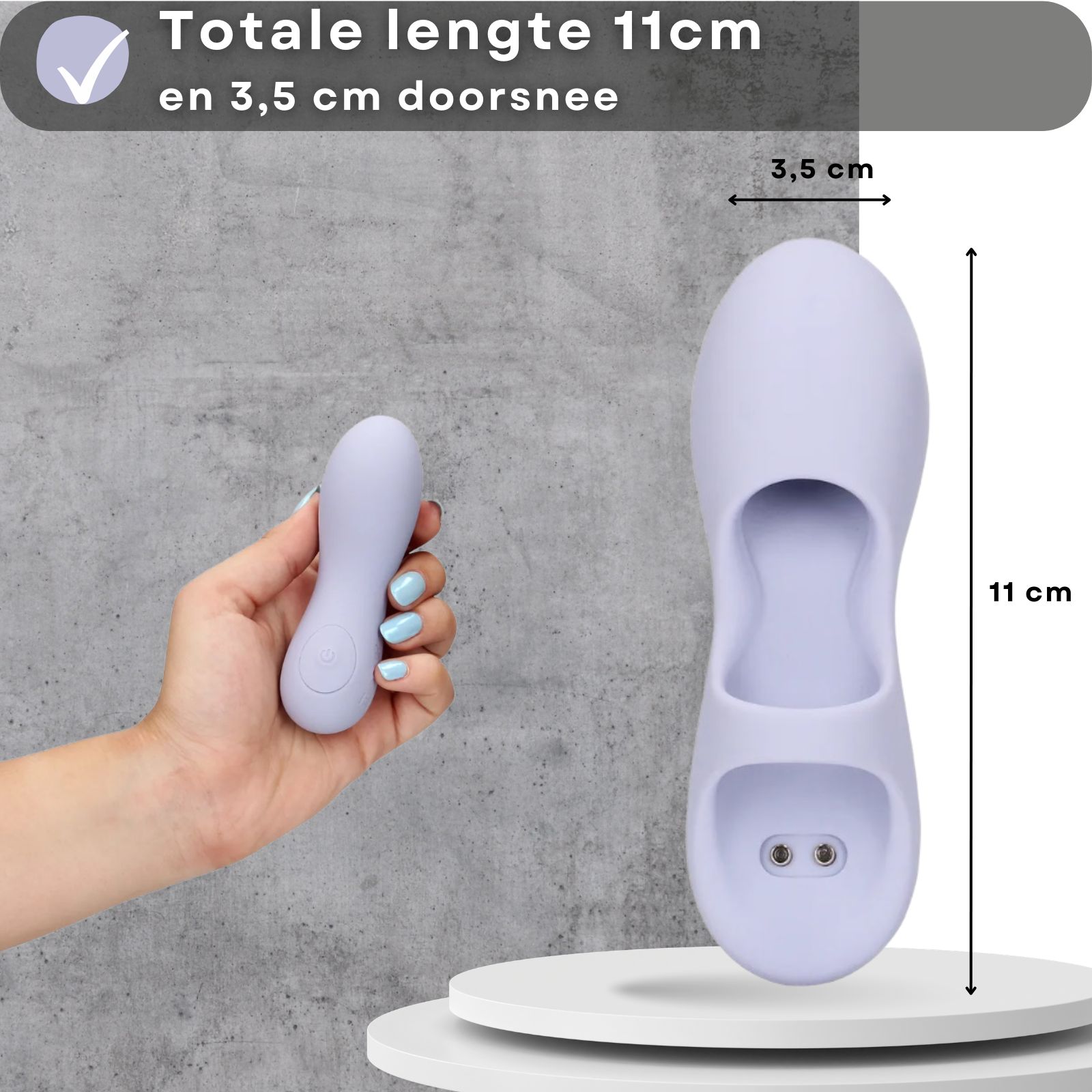 Lila vibrator. 11 cm lang, 3,5 cm diameter. In de hand gehouden.