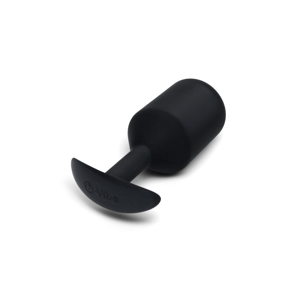 Zwarte siliconen butt plug met verbrede basis en plat handvat. Merk 'vibe' zichtbaar.