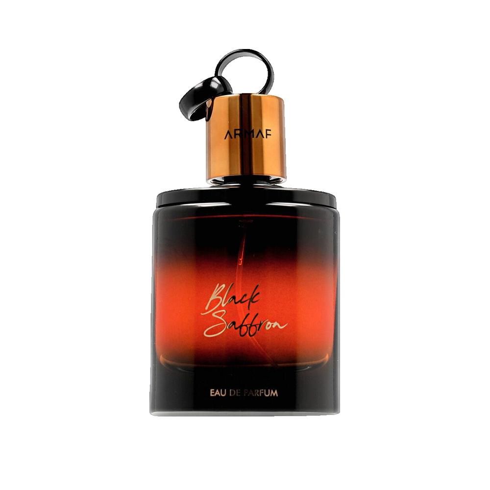 Flacon de parfum noir et or. Inscription "Black Saffron" et "Eau de Parfum".