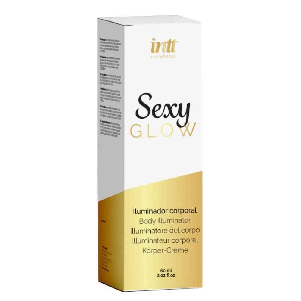 Body illuminator in verpakking. Witte doos met opschrift "SEXY GLOW". Gouden accenten.