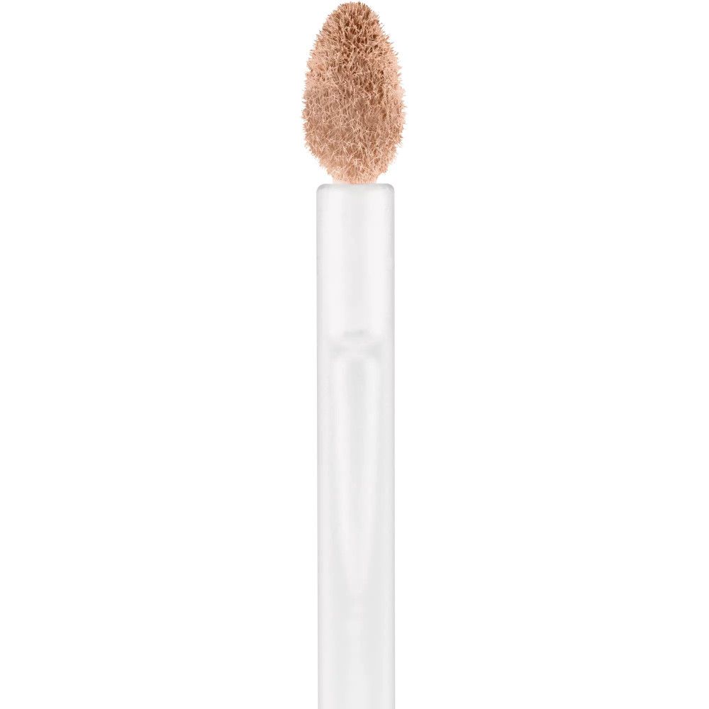 Embout applicateur avec correcteur. Couleur beige. Tige blanche.
