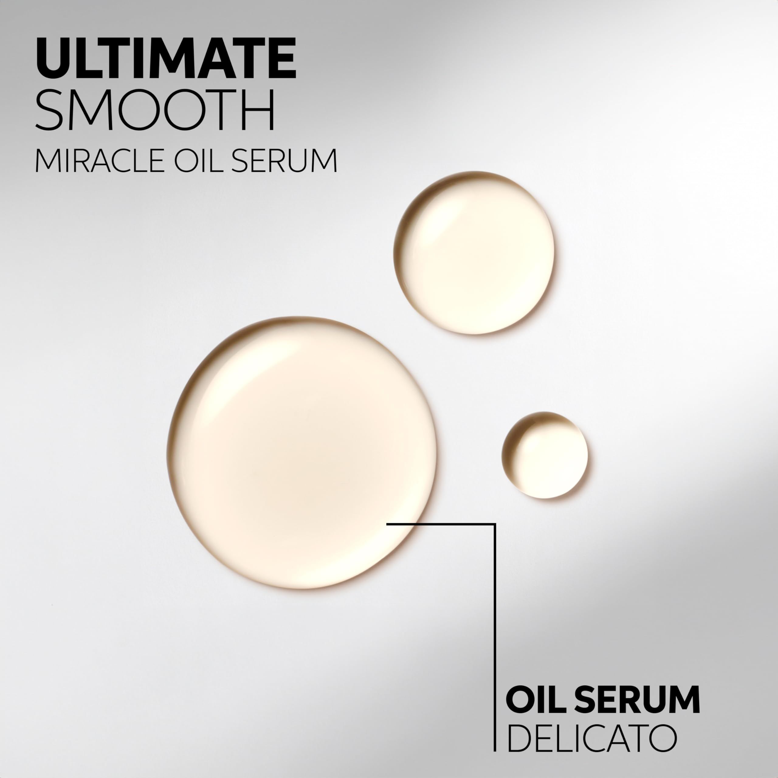 Trois gouttes rondes de sérum huileux. Texte : Oil Serum Delicato. Fond : gris clair.