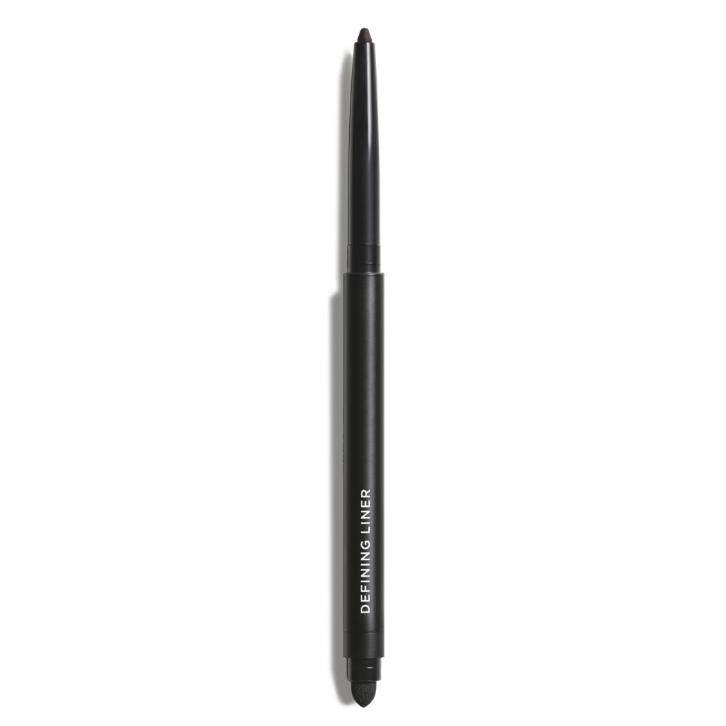 Zwarte eyelinerpen met de tekst "DEFINING LINER". Slanke, cilindrische vorm. Zwarte punt.