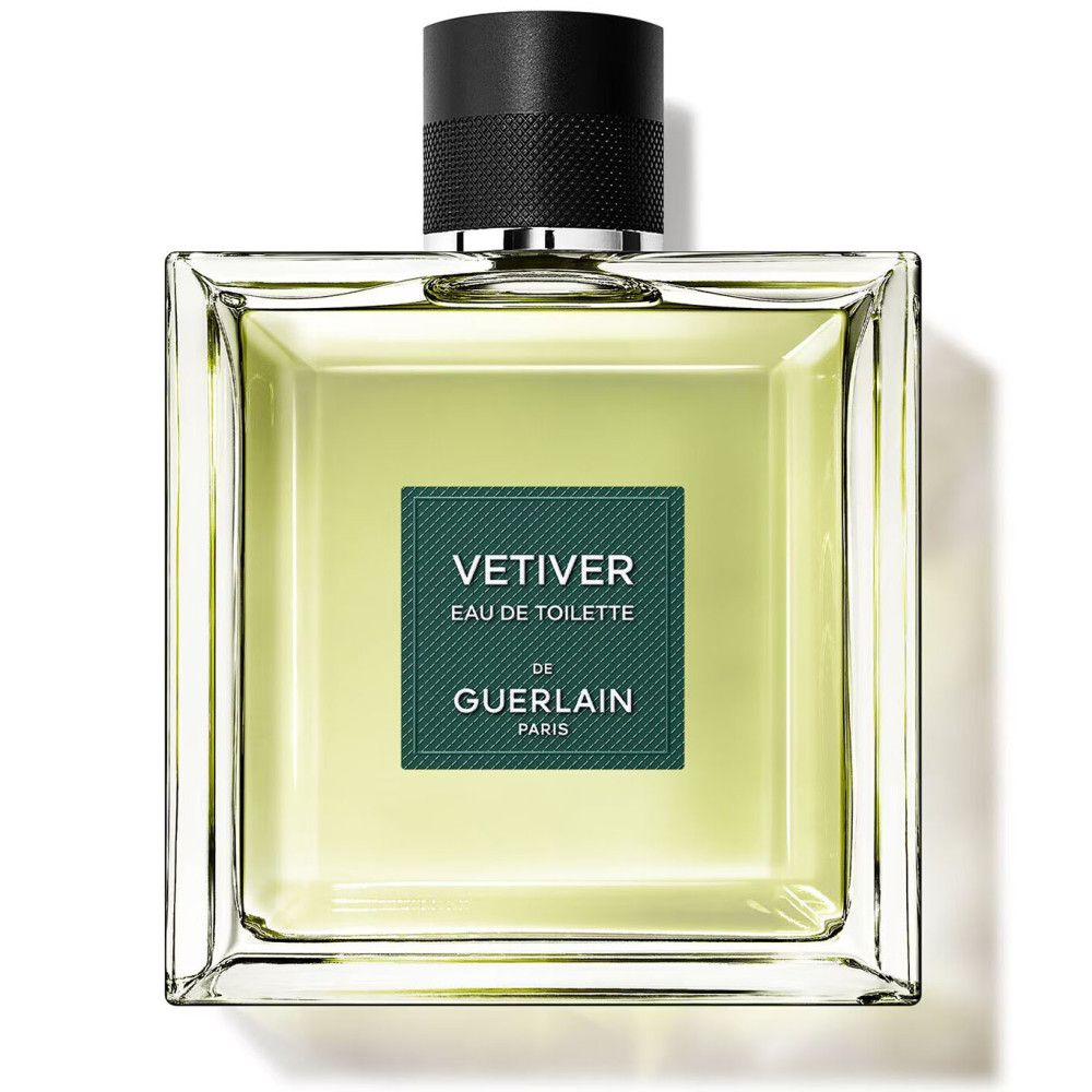 Flacon carré en verre avec bouchon noir. Étiquette "VETIVER EAU DE TOILETTE" de Guerlain.