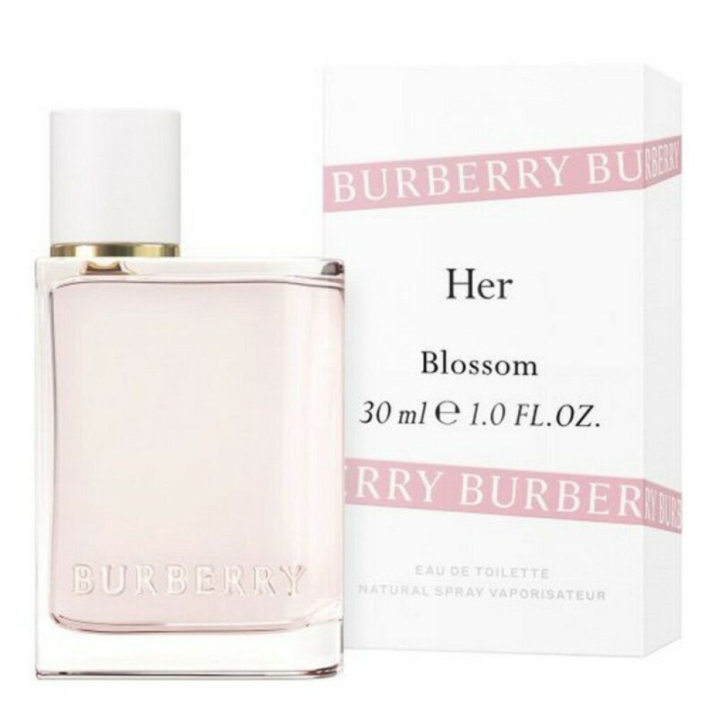 Flacon de parfum et emballage. Flacon avec bouchon blanc, liquide rose. Emballage avec texte: Burberry Her Blossom.