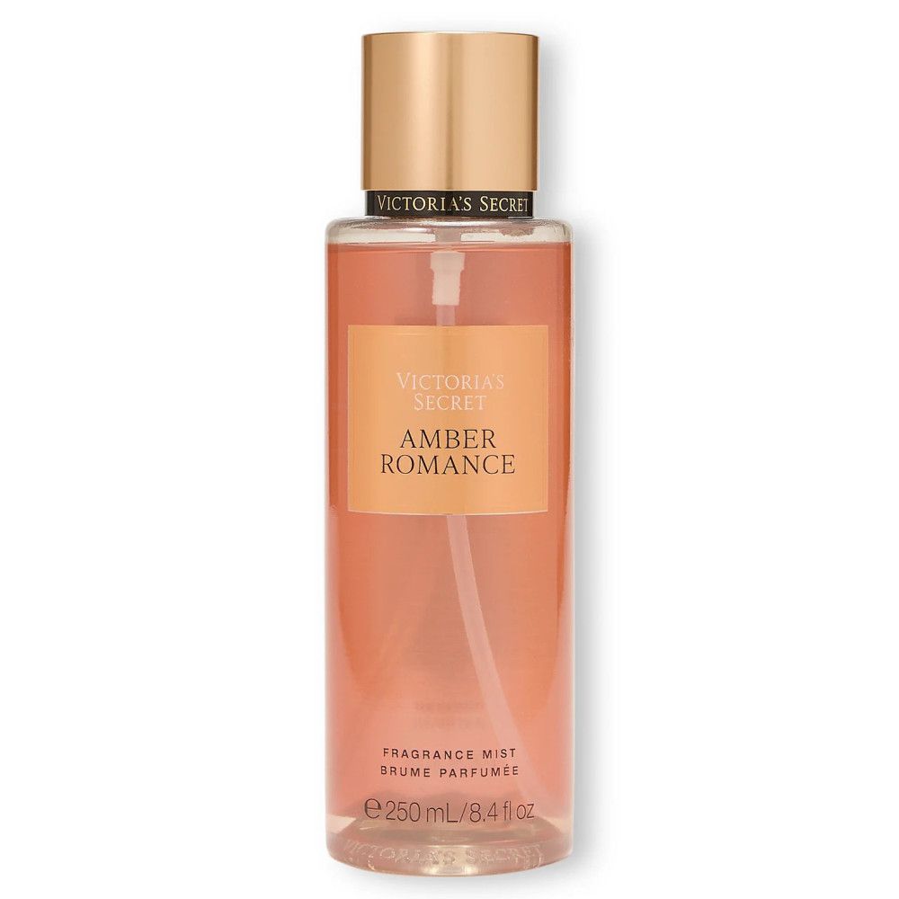 Flacon de brume pour le corps. Étiquette "Amber Romance". Bouchon doré. Marque: Victoria's Secret.