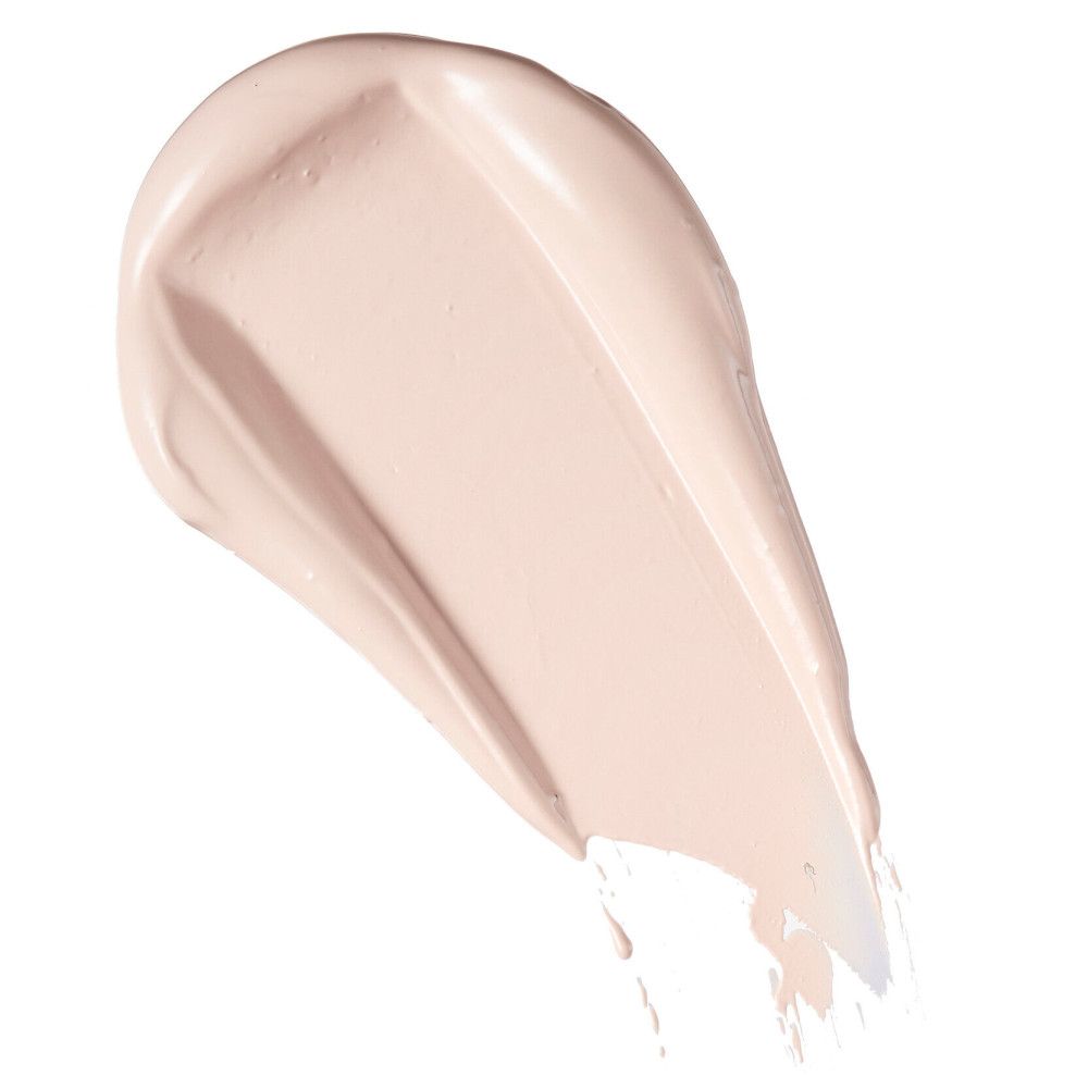 Trace de produit beige clair. Texture: crémeuse. Fond: blanc.