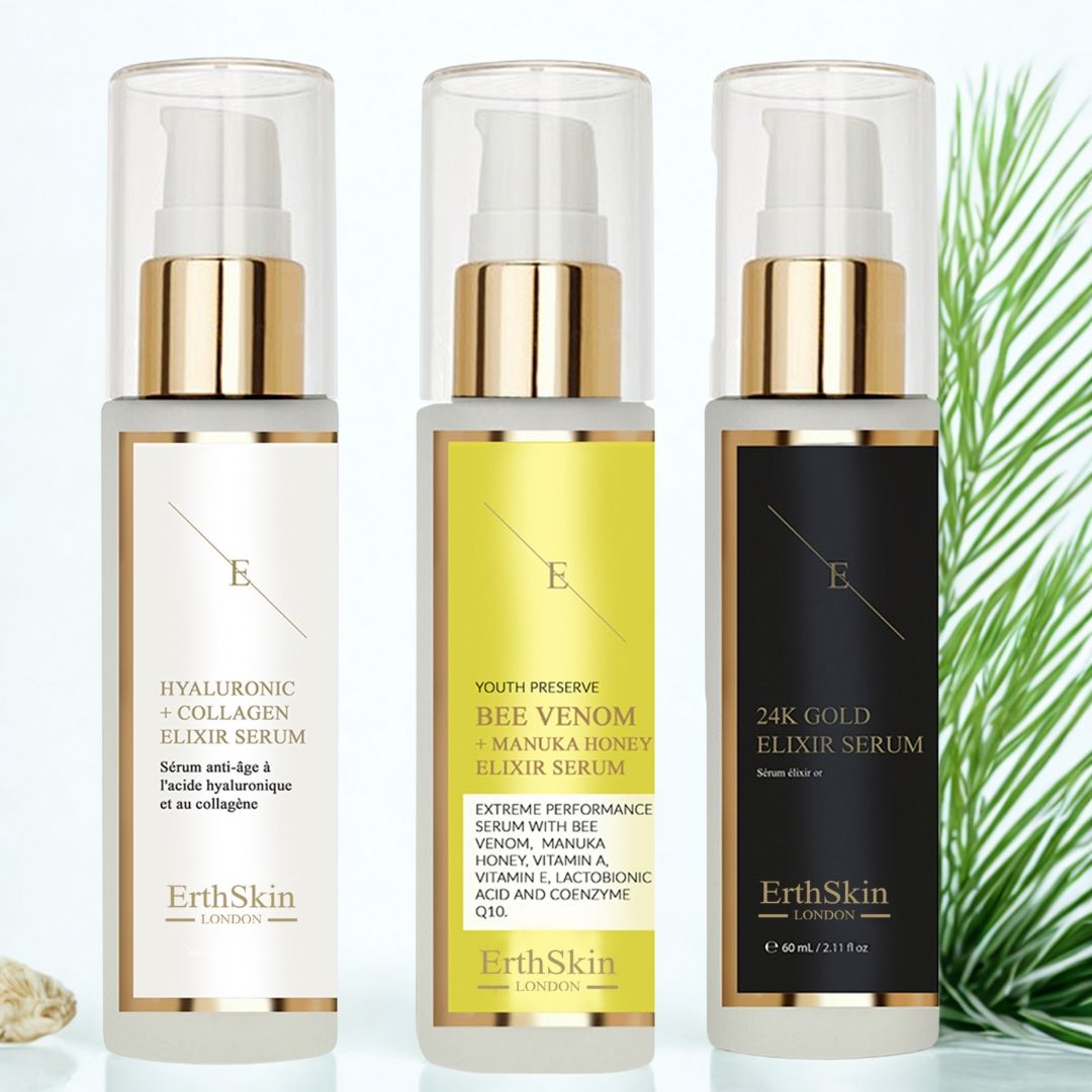 Drie serumflessen met pomp. Labels: Hyaluronzuur + collageen, Bijengif + Manuka honing, 24K goud. Merk: ErthSkin London.