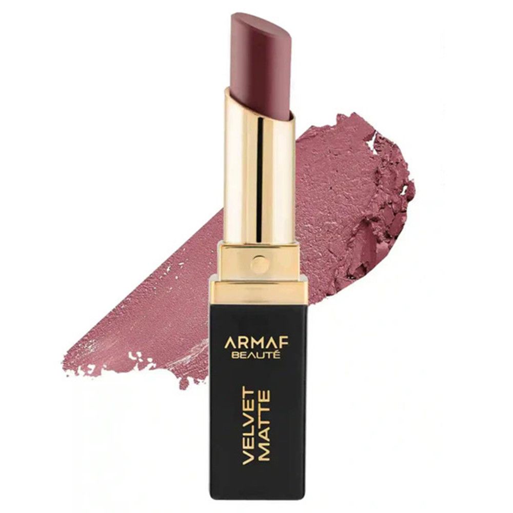 Een matte lipstick in een zwarte huls met gouden accenten, naast een kleurstaal.