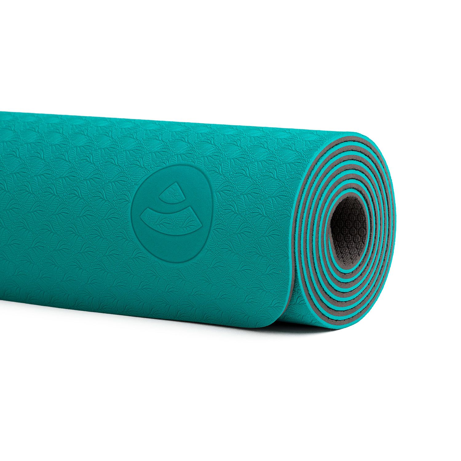 Opgerolde yogamat, turquoise en grijs. Logo op de turquoise kant. Close-up.