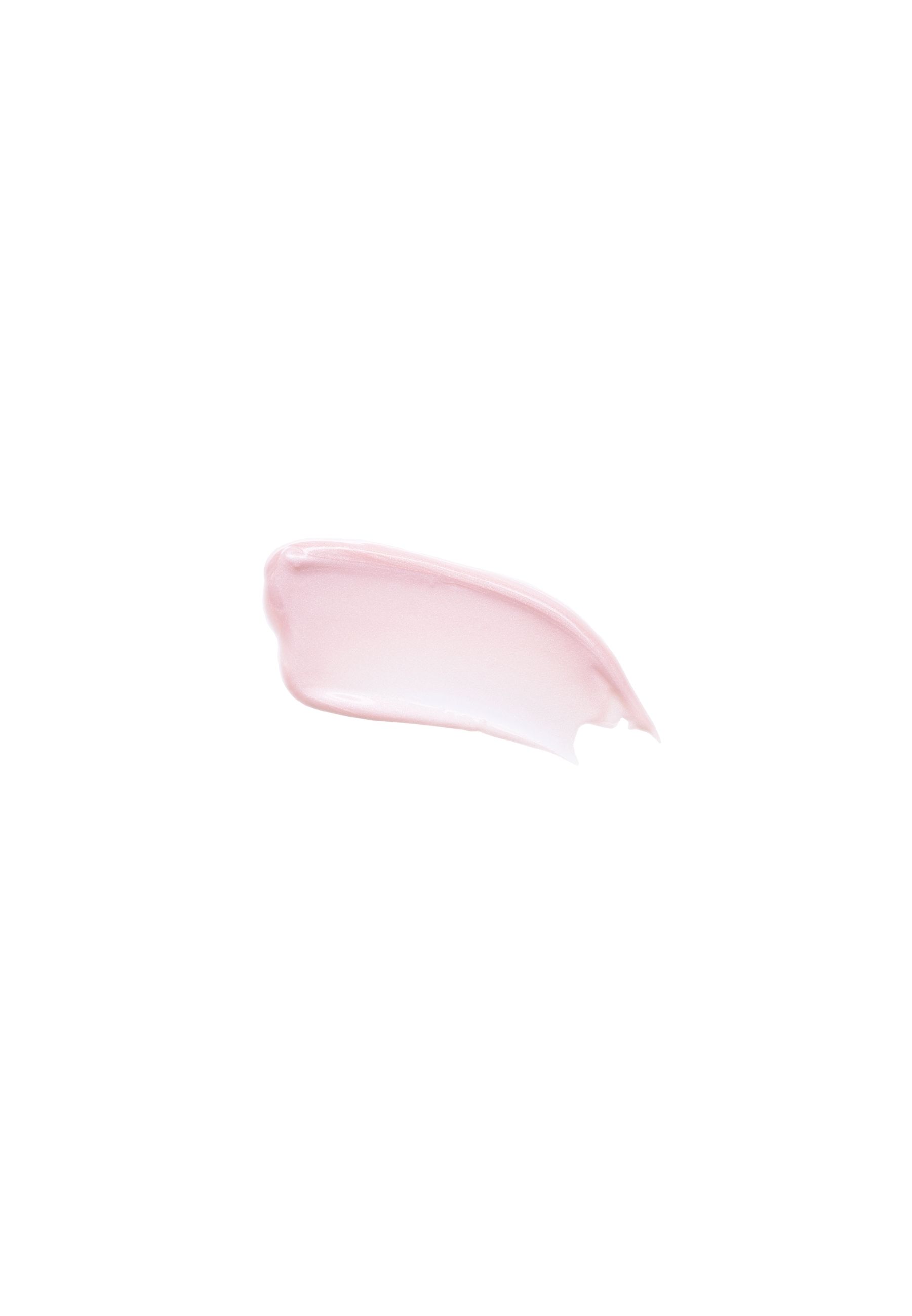 Échantillon de mousse nettoyante rose sur fond blanc.