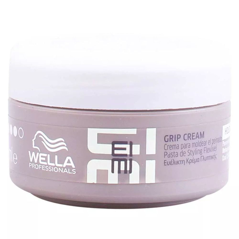 Potje Wella Eimi Grip Cream. Grijze pot met witte deksel. Opschrift Eimi en Grip Cream.