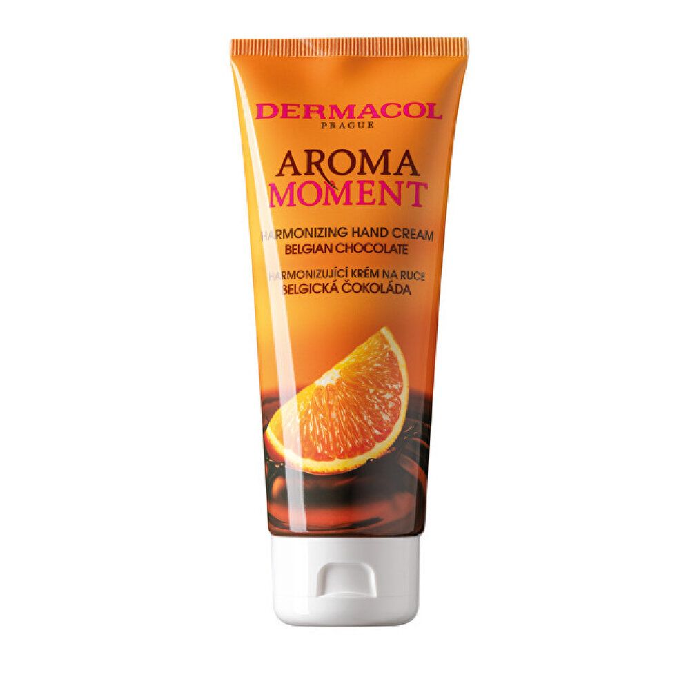 Tube de crème pour les mains, design orange-brun. Texte: Dermacol Aroma Moment, chocolat belge. Image d'une tranche d'orange.