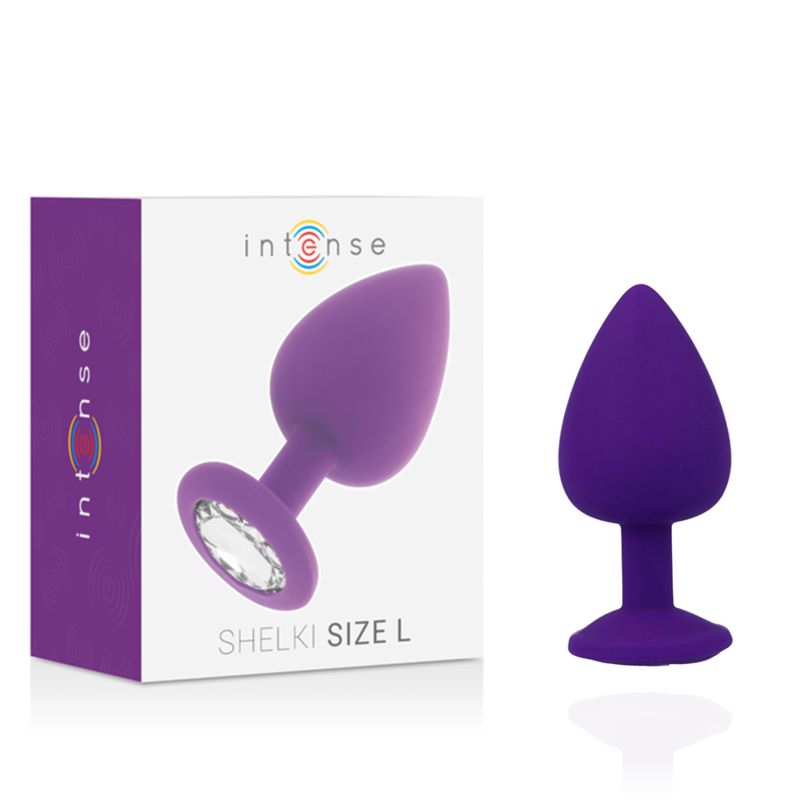 Emballage et plug anal violet avec décoration en cristal.