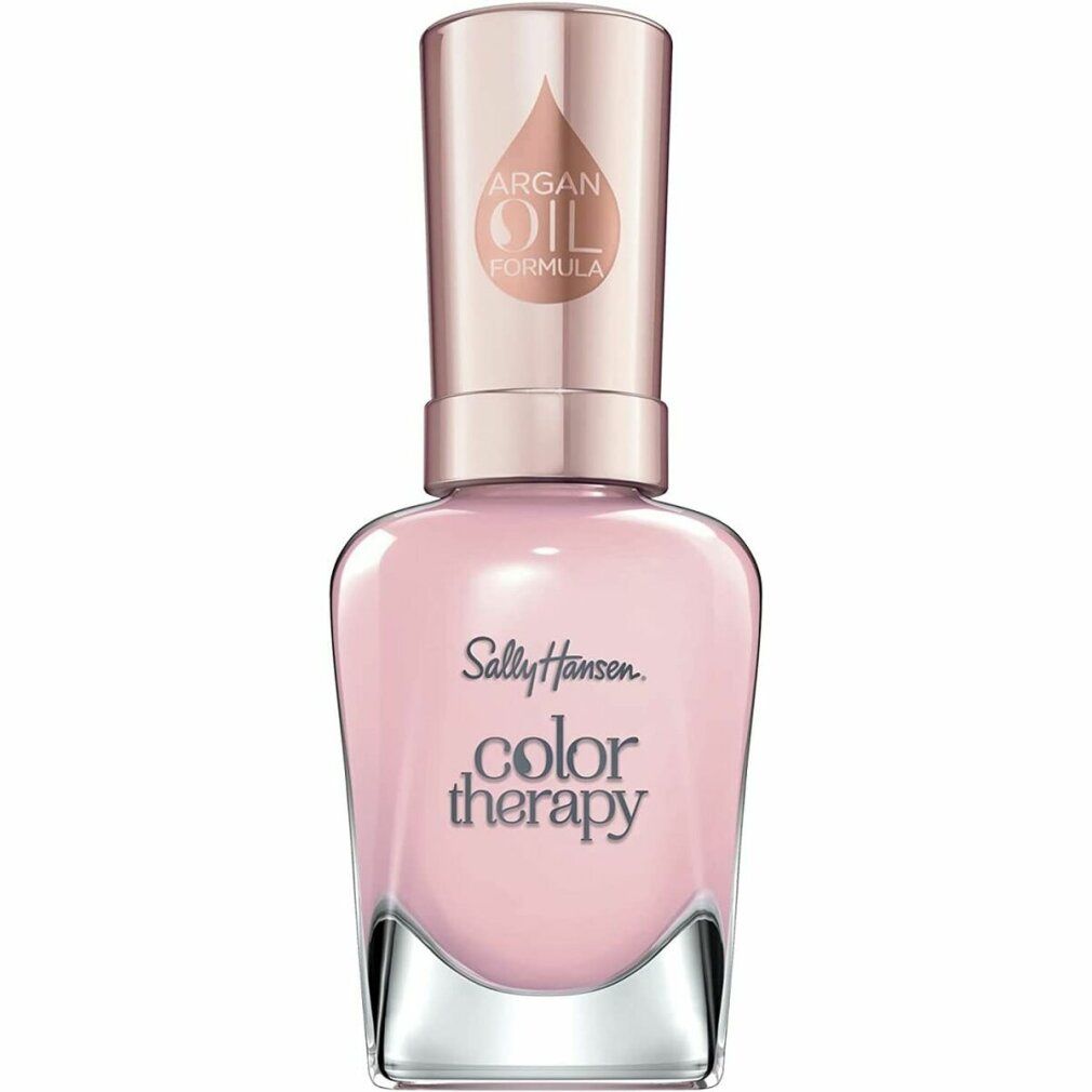 Flacon de vernis à ongles rose clair. Inscription: Sally Hansen Color Therapy. Bouchon avec logo formule à l'huile d'argan.