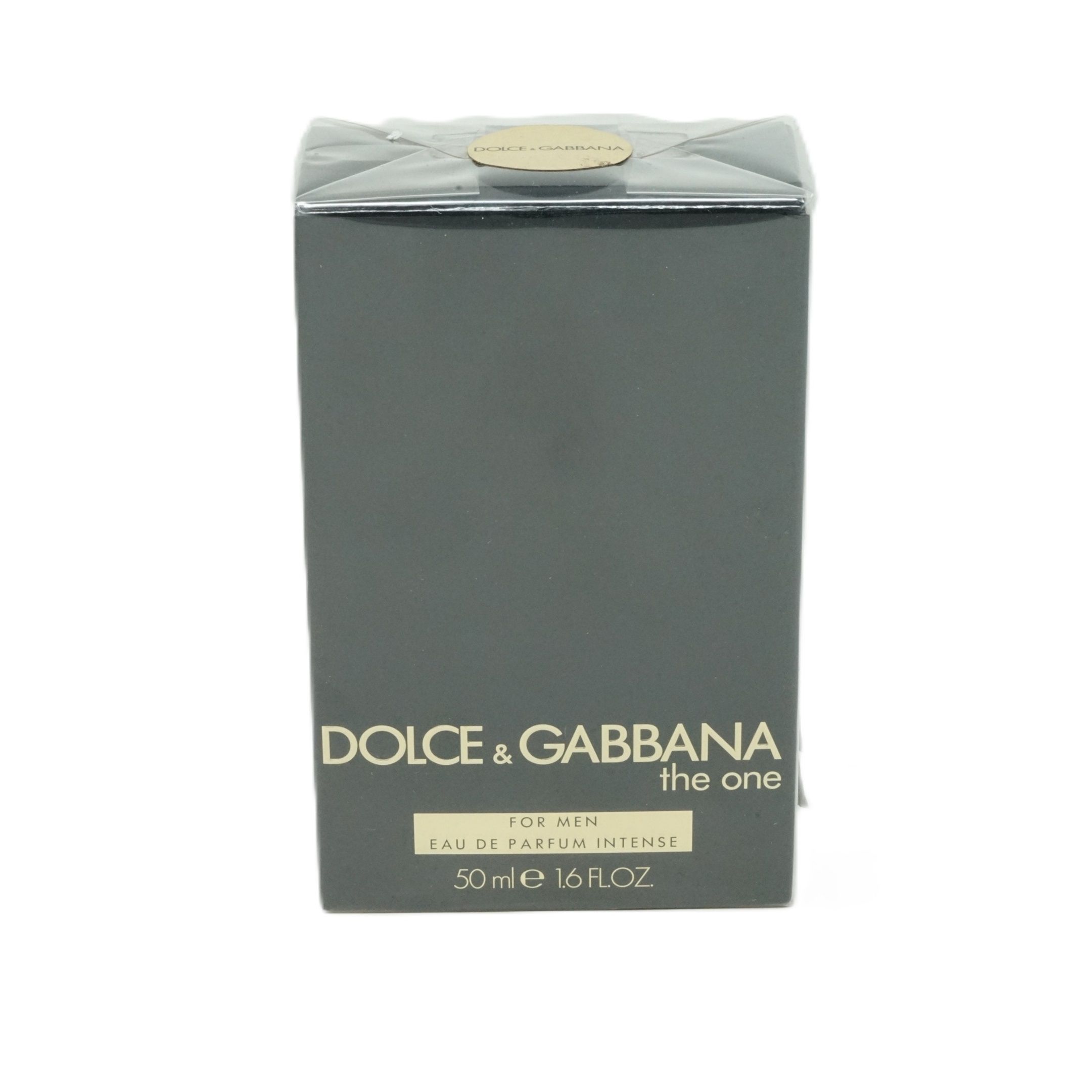 Donkergrijze rechthoekige verpakking. Opschrift: DOLCE & GABBANA the one FOR MEN Eau de Parfum Intense. 50 ml 1.6 FL.OZ.