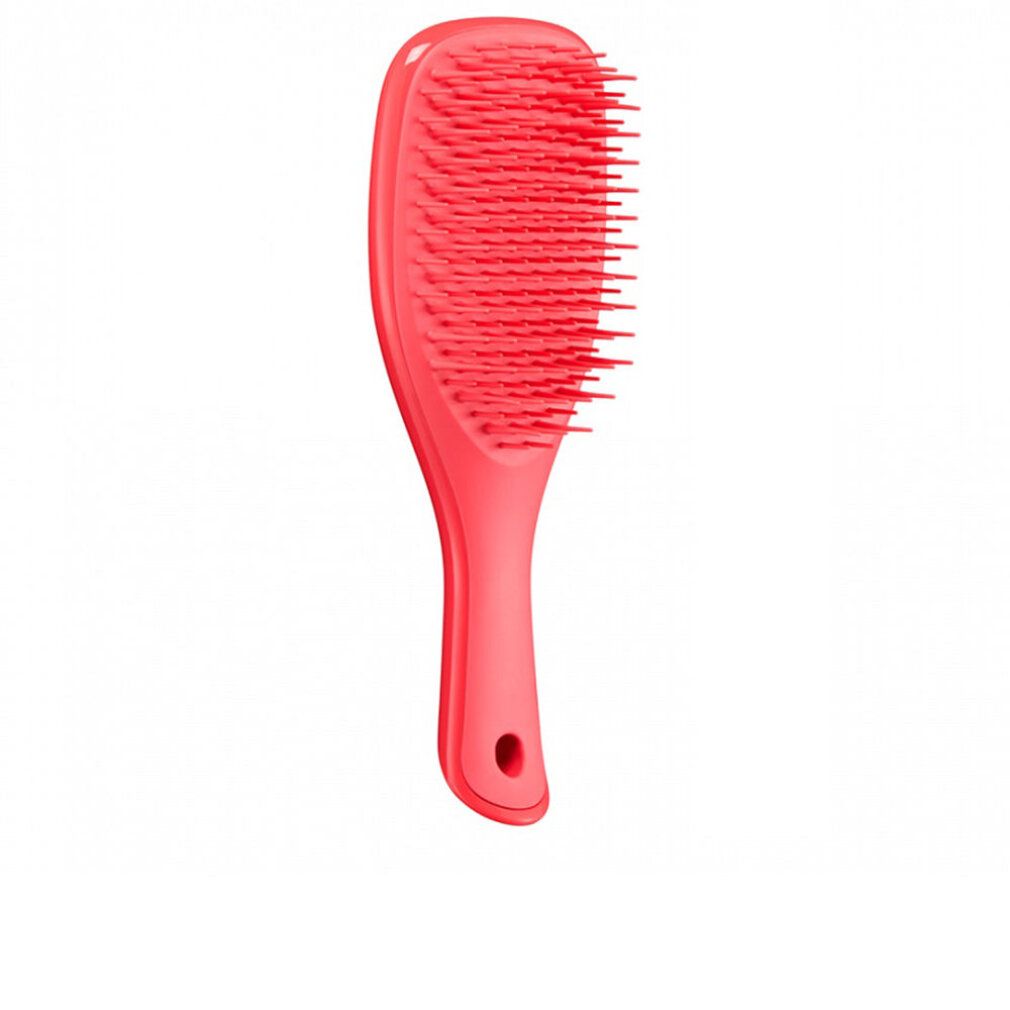 Brosse à cheveux rouge avec manche et picots. Manche percé. Sur fond blanc.