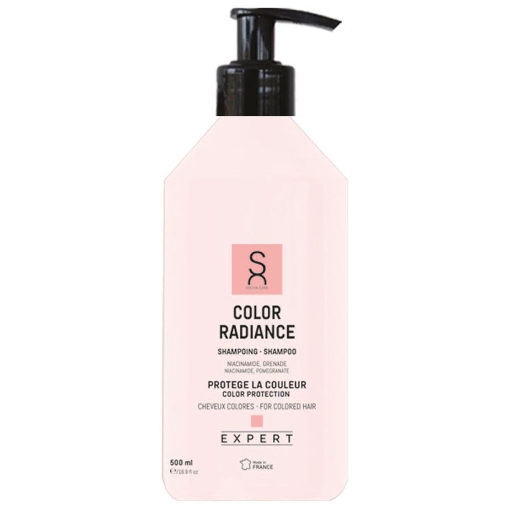 Flacon de shampooing rose avec pompe noire. Inscription: Color Radiance, Shampooing, protège la couleur, pour cheveux colorés. Expert.