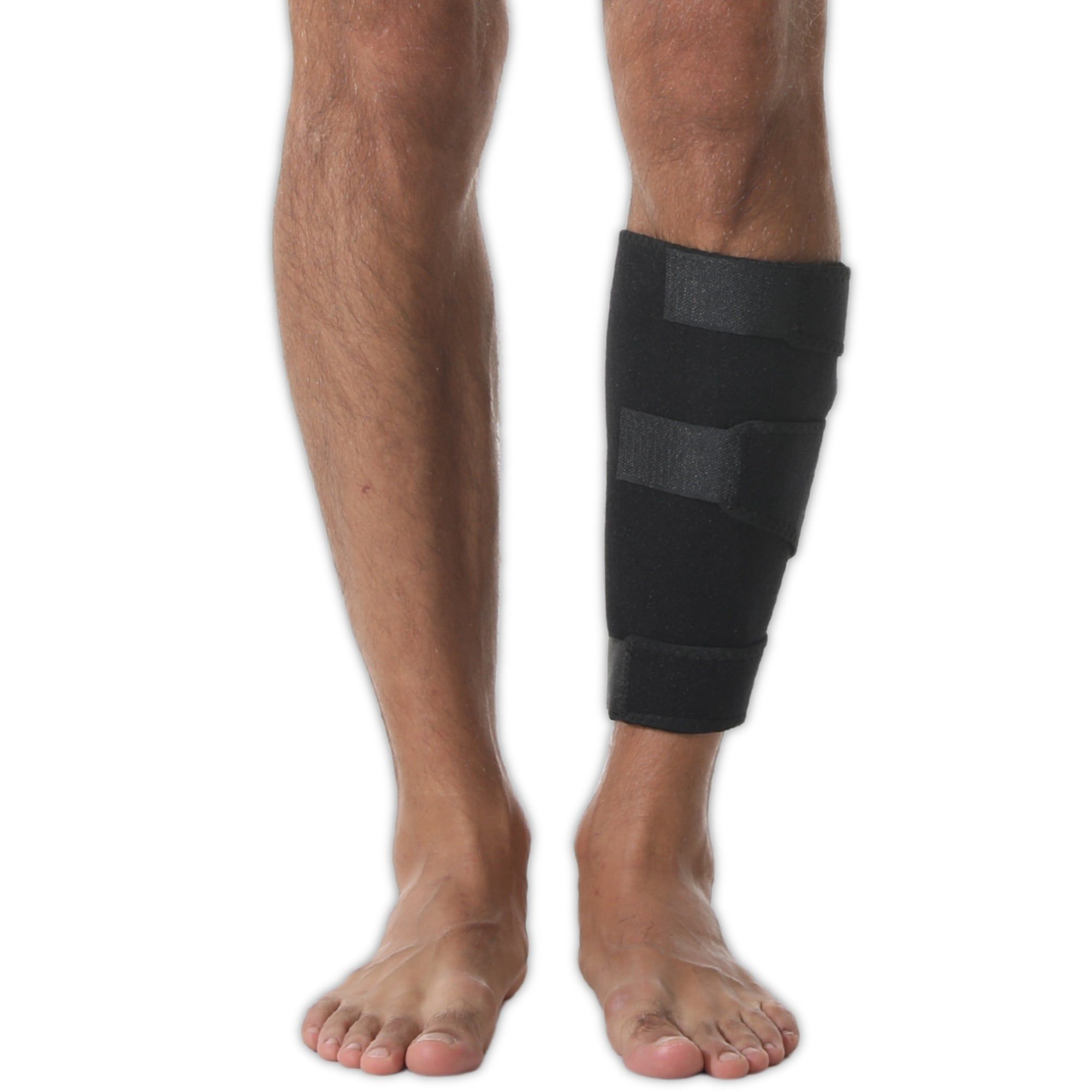 Genouillère noire avec attaches velcro sur la jambe.