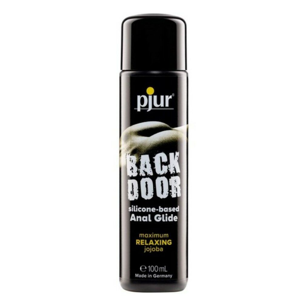 Zwarte fles met geel logo. Opschrift: BACK DOOR Relaxing Silicone Anal Glide. Met jojoba. 100 ml. Gemaakt in Duitsland.