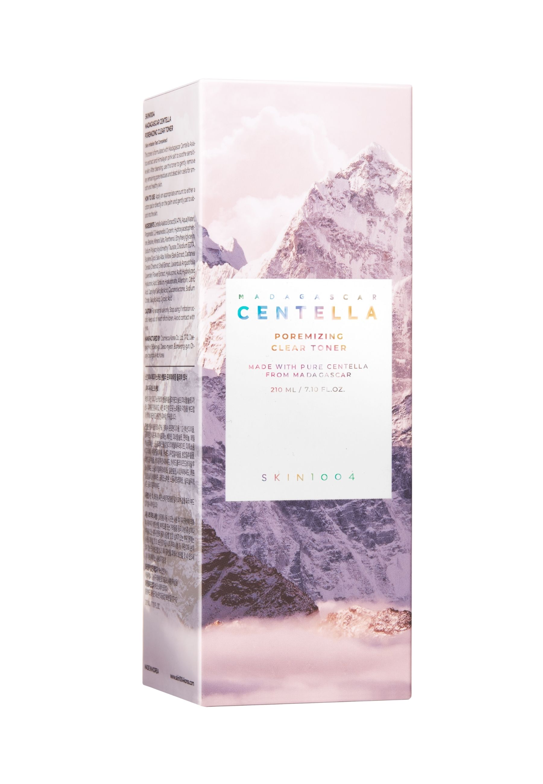 Kartonnen verpakking met berglandschap. Productnaam en logo op de voorkant. Meertalige tekst.