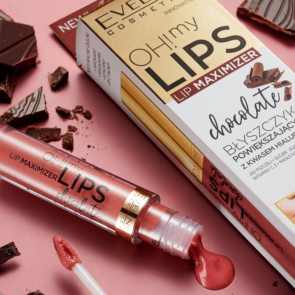 Eveline Cosmetics Oh! My Lips Lip Maximizer Chocolate. Tube avec applicateur, produit sur fond rose, morceaux de chocolat.