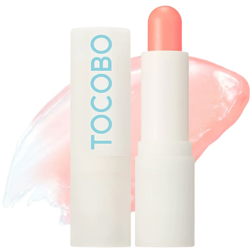 Lippenbalsem met open dop. Roze lippenstiftpunt zichtbaar. TOCOBO tekst.