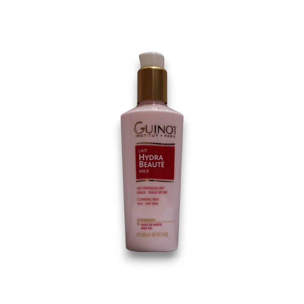 Roze fles met gouden dop. Opschrift: Guinot, Lait Hydra Beauté, Cleansing Milk. Voor de droge huid.