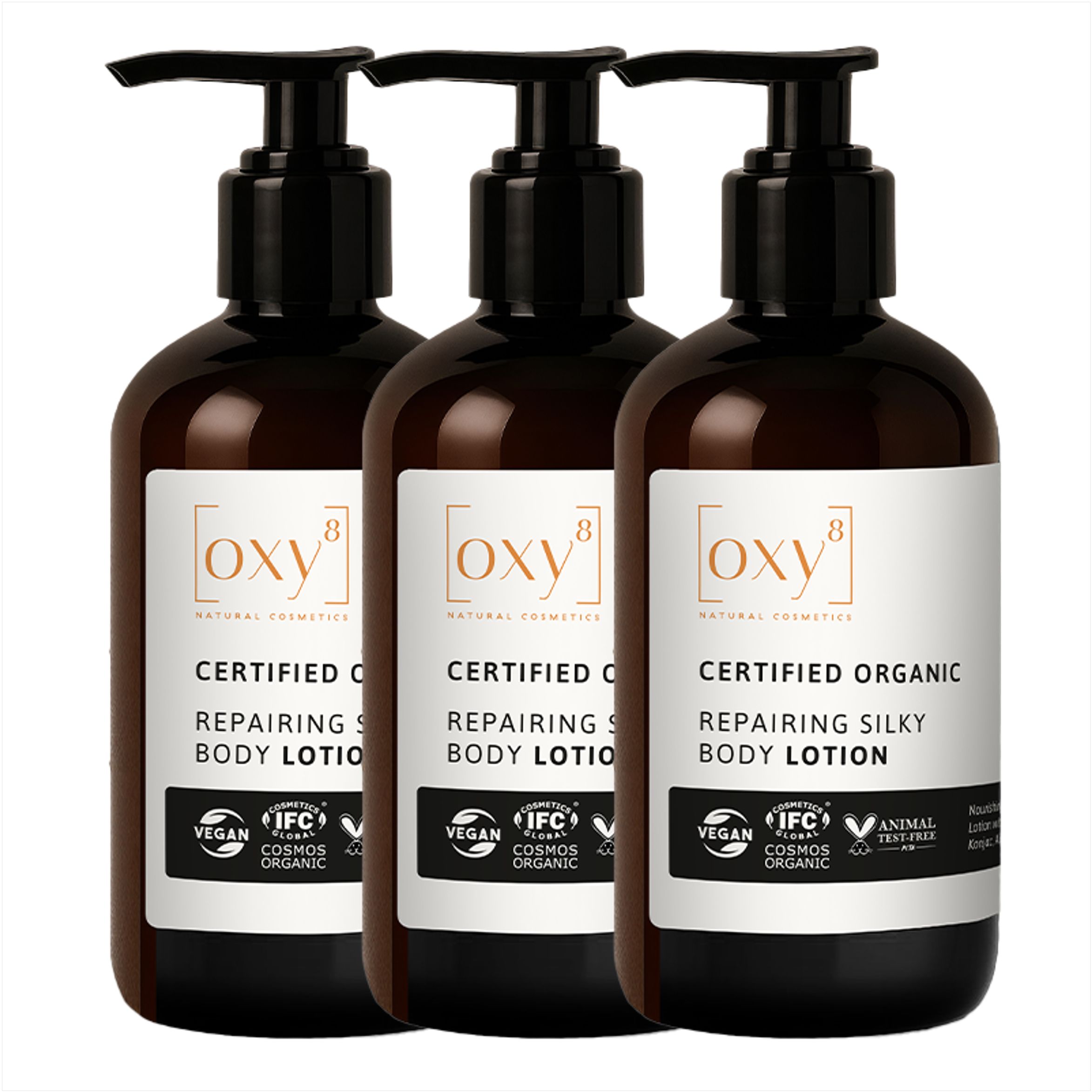 Trois flacons de lotion pour le corps Repairing Silky avec pompe. Inscription : Certified Organic, Vegan, Cosmos Organic.