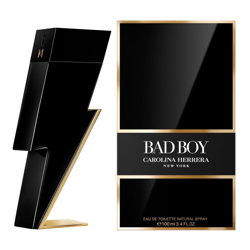 Flacon noir en forme d'éclair avec détails dorés et emballage. Inscription : BAD BOY CAROLINA HERRERA NEW YORK.