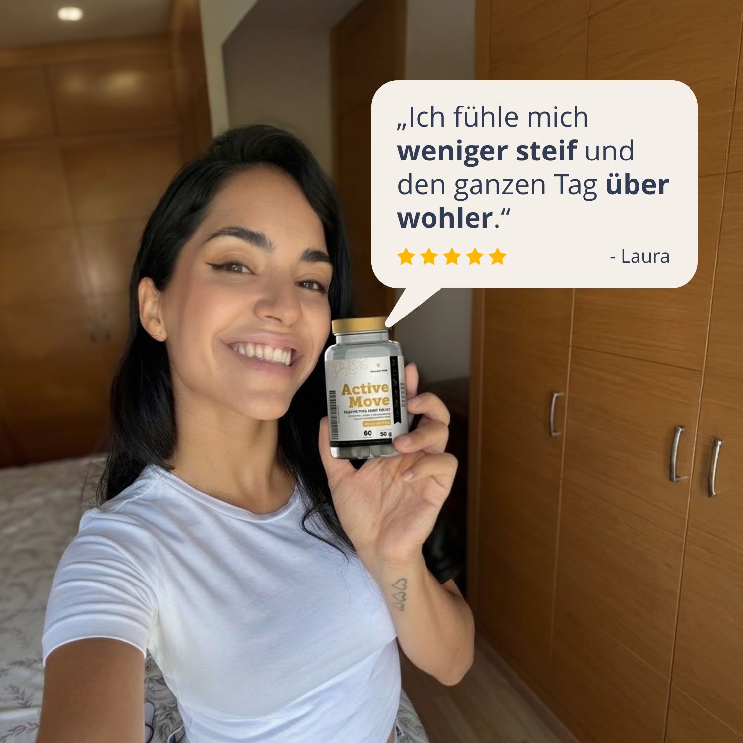 Femme tenant une bouteille de Golden Tree Active Move. Citation : 'Je me sens moins raide et plus à l'aise toute la journée.' - Laura.