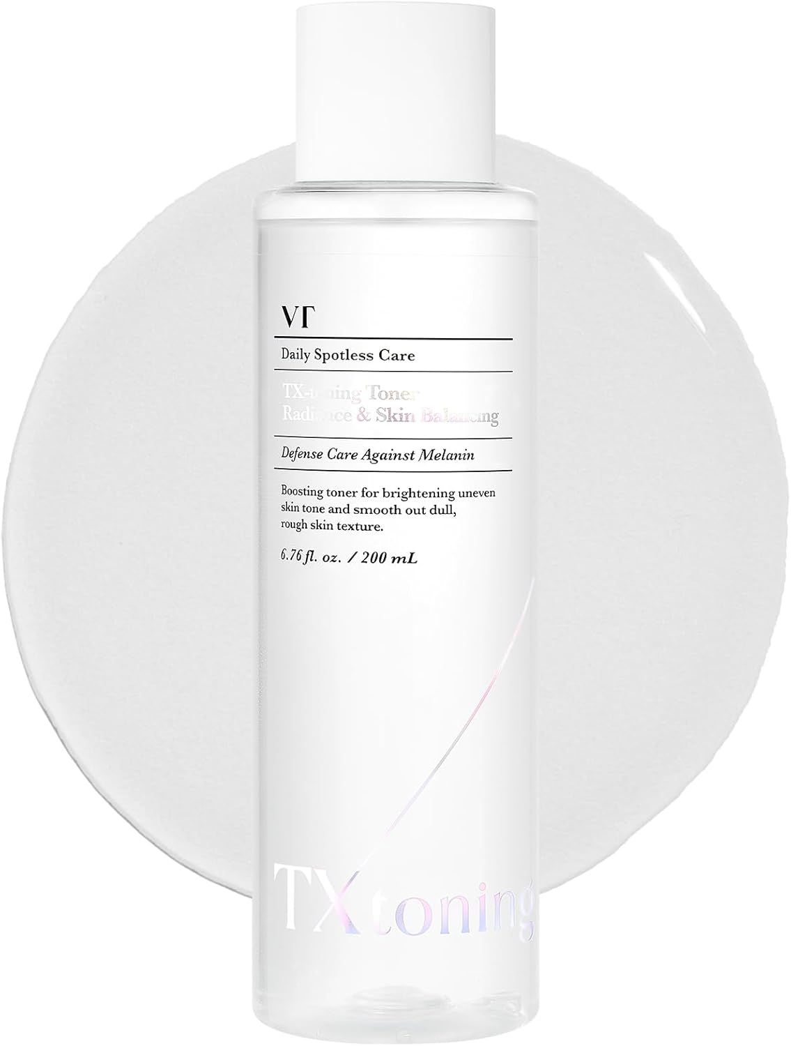 Flacon de toner transparent avec bouchon blanc. Inscriptions: VT, Daily Spotless Care, TX-Toning, Balance & Skin Balancing. 6.76 fl. oz. / 200 mL.