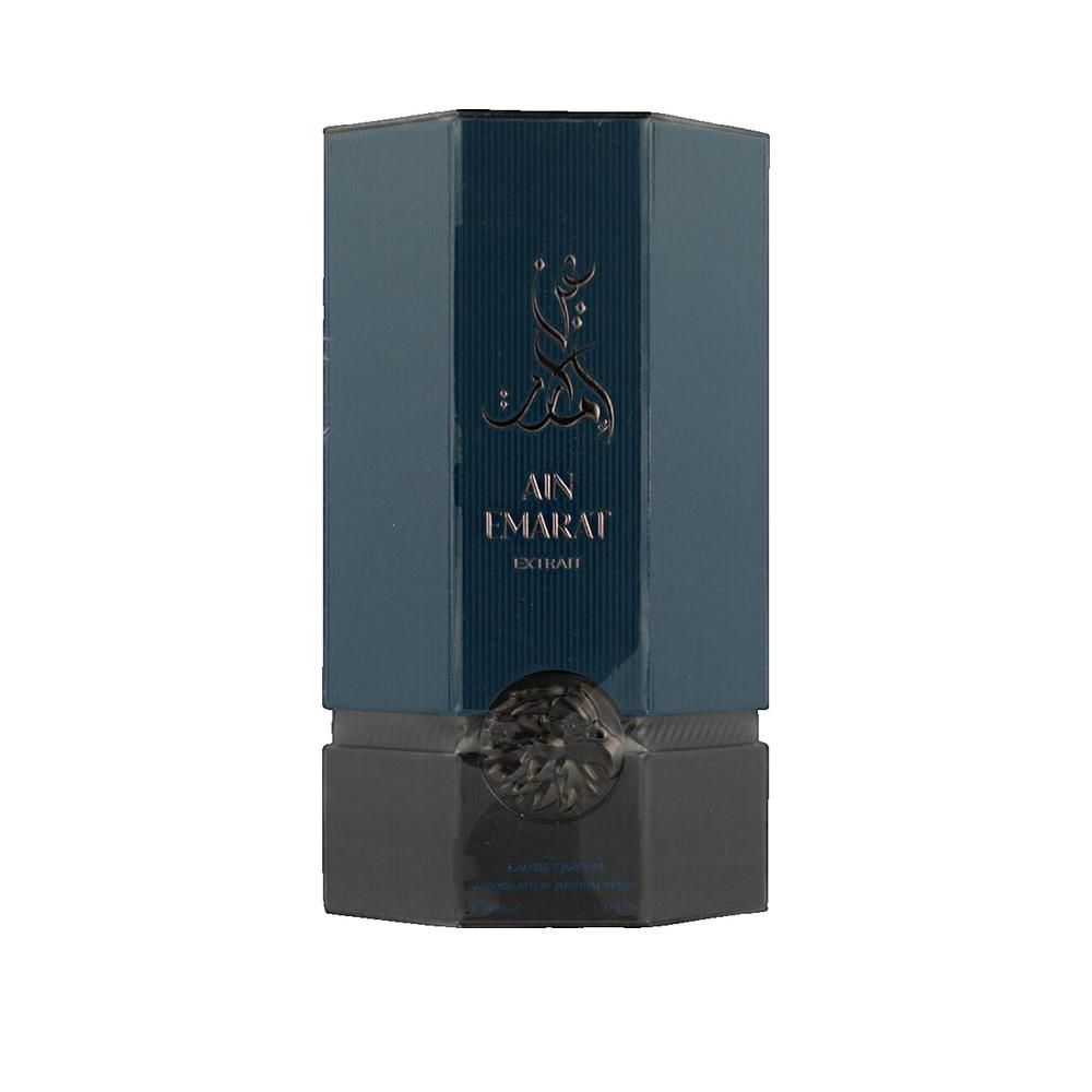 Boîte octogonale bleue et grise. Inscription Ain Emarat Extrait. Éléments décoratifs dorés.