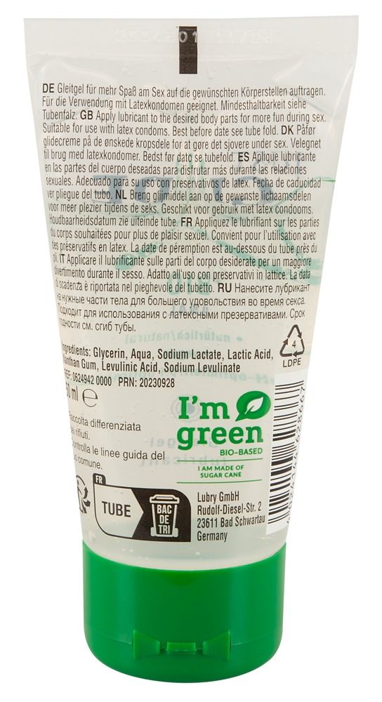 Achterkant van een tube met groene dop. Tekst in meerdere talen. Ingrediënten, fabrikant en certificering. 'I'm green' label.