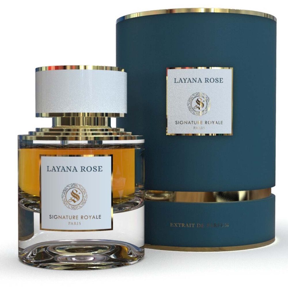 Parfumfles en verpakking. Fles met gouden elementen en witte dop. Blauwe verpakking met gouden accenten en productnaam.