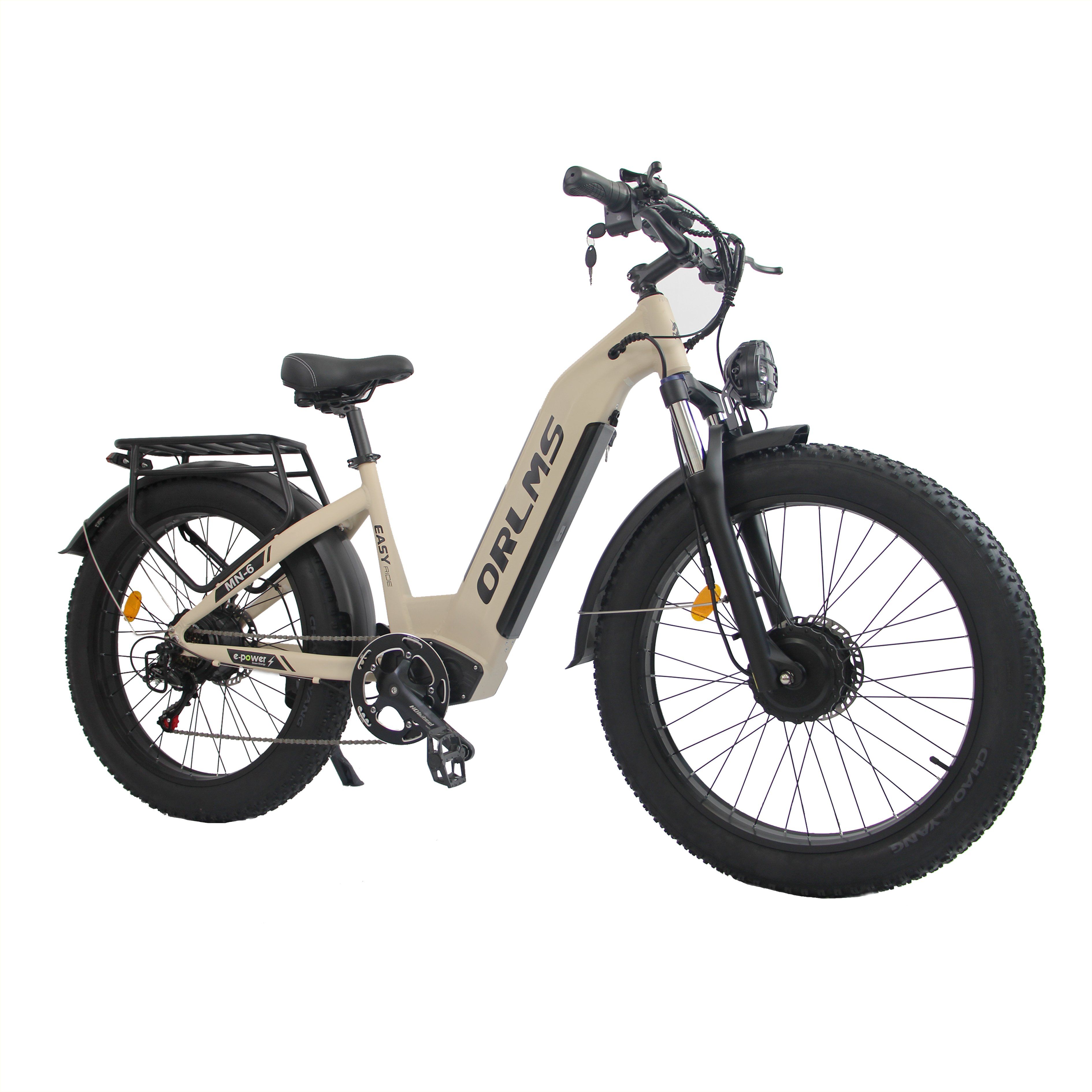 Vélo électrique beige, pneus noirs. Marque ORLMS visible.
