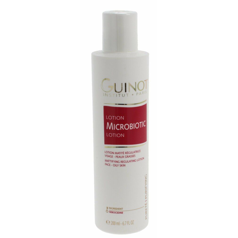 Witte fles Guinot Microbiotic. Rood etiket: Lotion mattifiante, vette huid. 200ml. Witte dop.