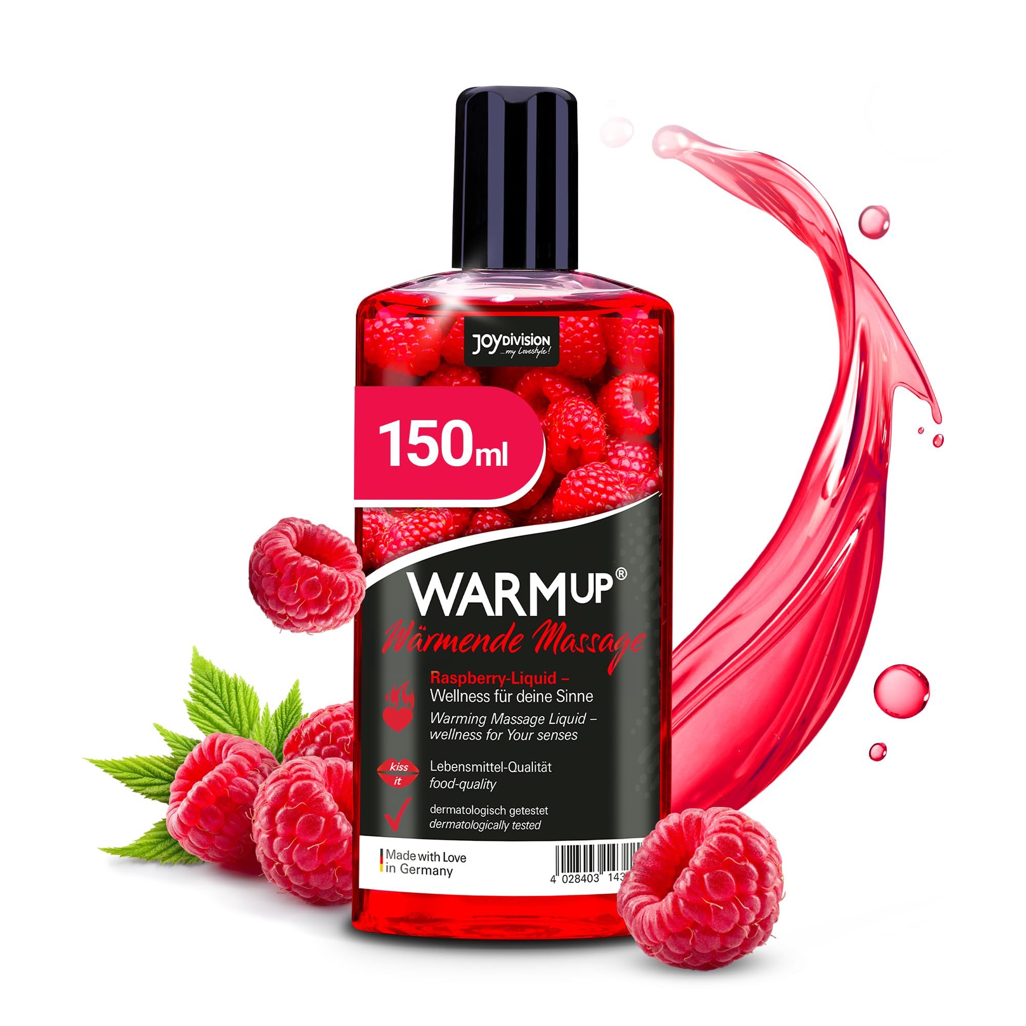Bouteille d'huile de massage à la framboise, entourée de framboises fraîches.