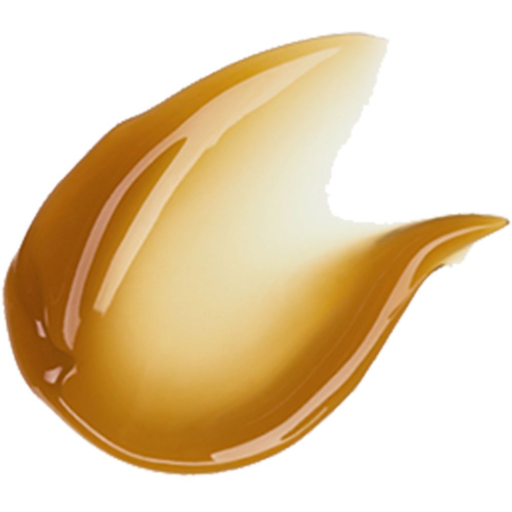 Uitgesmeerde, goudkleurige crème. Kleurverloop van goudbruin naar lichtgeel.