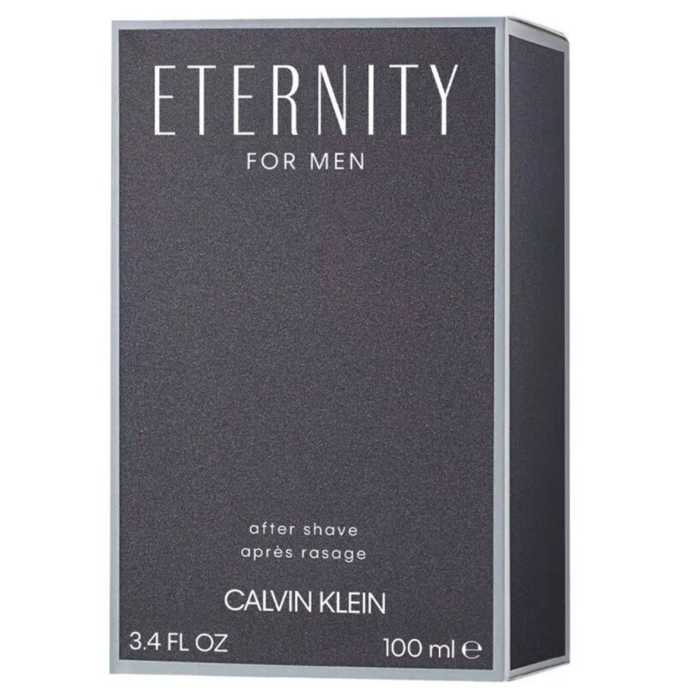 Boîte rectangulaire grise foncée. Inscription : ETERNITY FOR MEN, after shave, CALVIN KLEIN. En bas : 3.4 FL OZ et 100 ml.