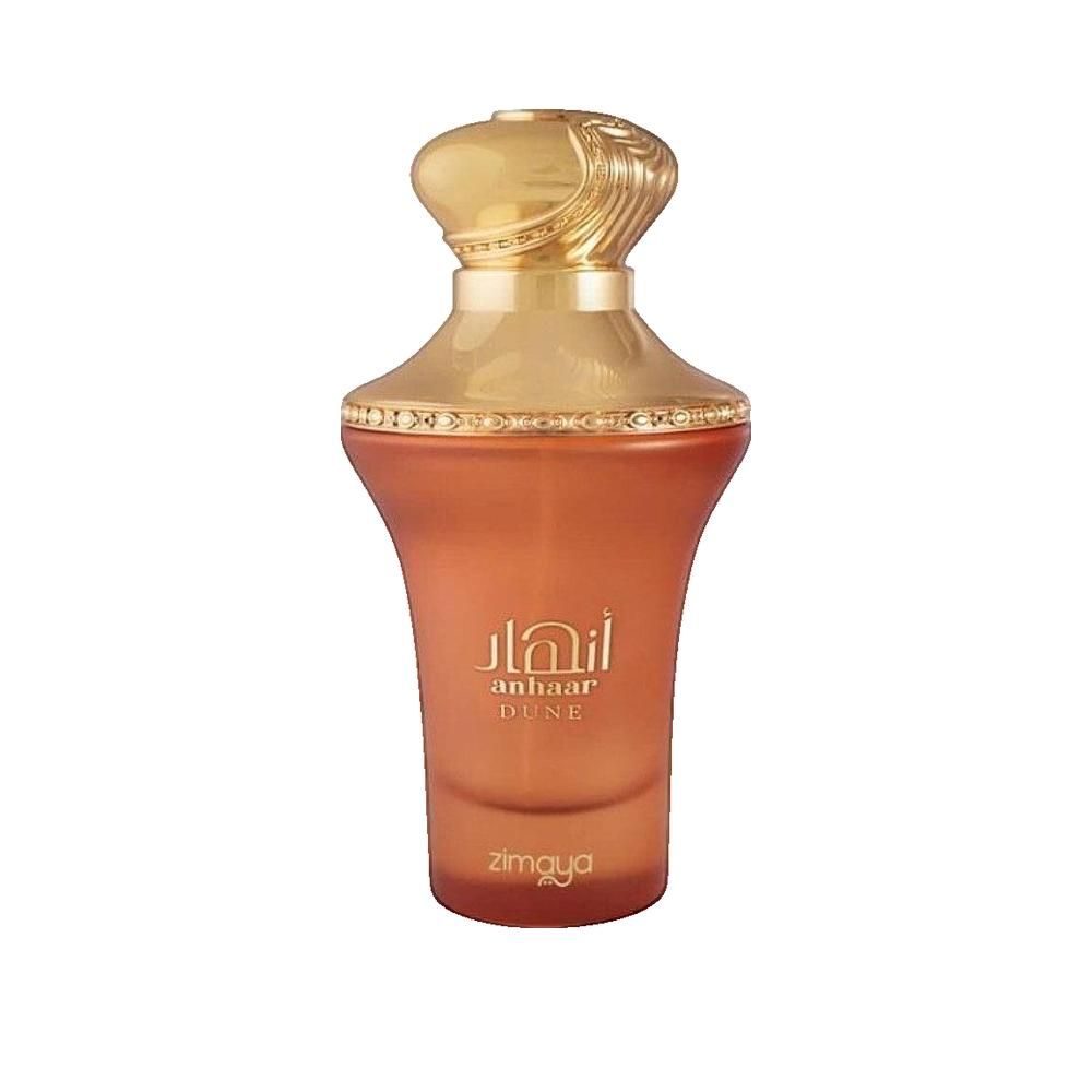 Flacon de parfum avec bouchon doré. Le flacon est de couleur marron et de forme élégante. Inscription en arabe.