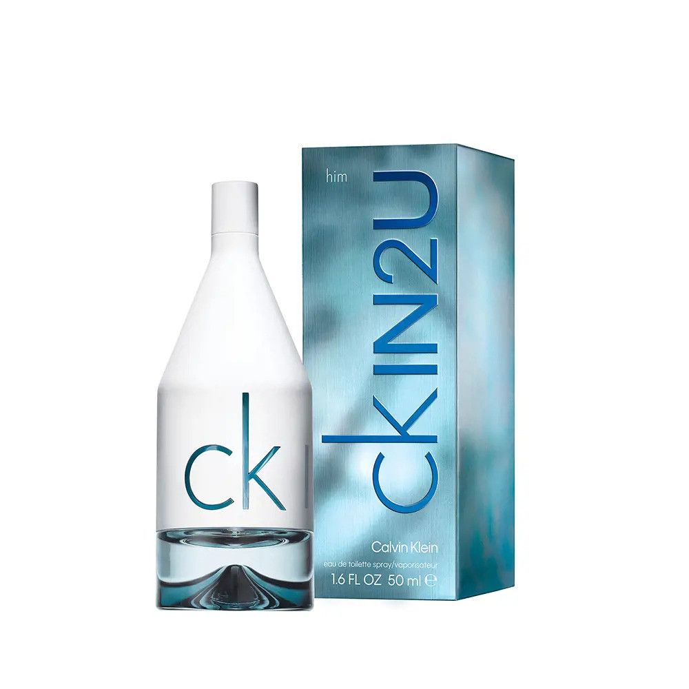 Flacon et emballage Calvin Klein CKIN2U for him. Flacon blanc, emballage bleu avec inscription CKIN2U.