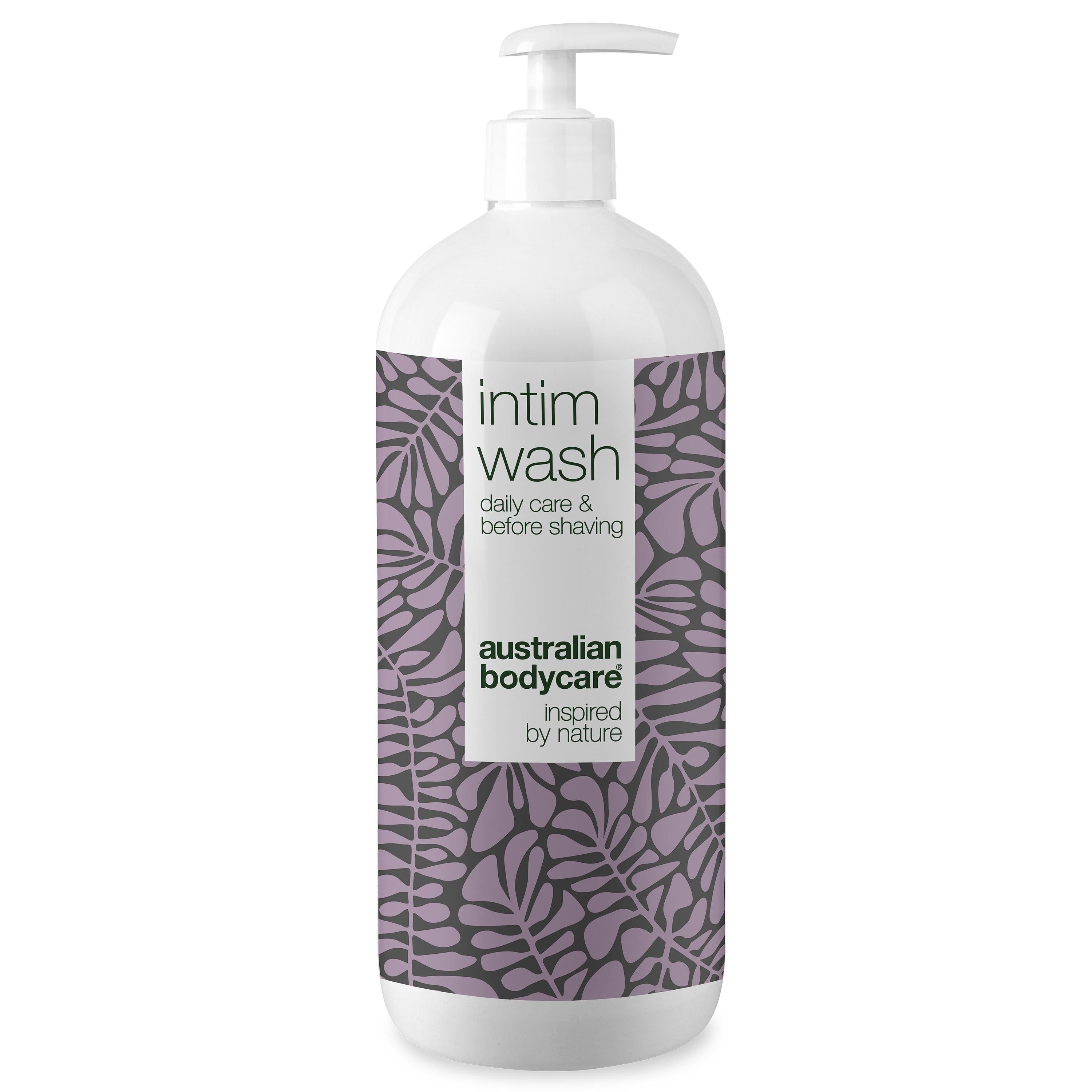 Flacon de nettoyant intime. Distributeur blanc, étiquette violette à motifs de feuilles. Marque : Australian Bodycare.