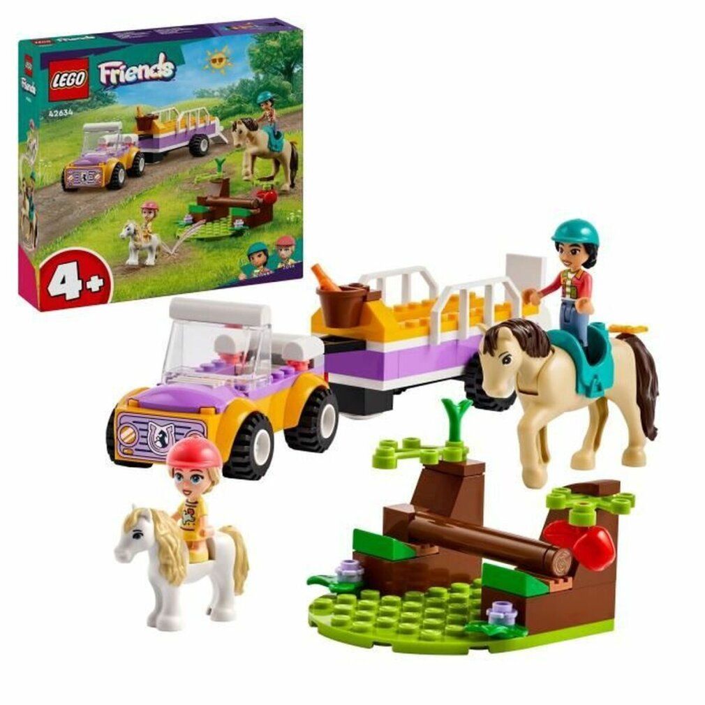 Ensemble LEGO Friends avec voiture, remorque, chevaux, poney et figurines. Emballage en haut à gauche. Recommandé pour 4 ans et plus.
