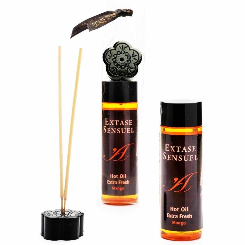 Deux flacons d'Extase Sensuel Hot Oil Extra Fresh Mango, un diffuseur de parfum avec bâtonnets et un pendentif décoratif.